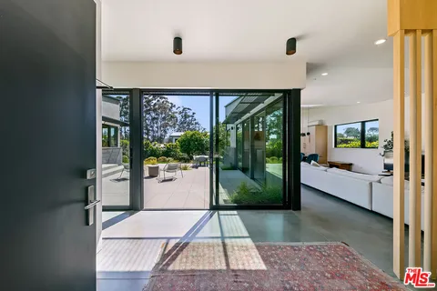 a bathroom with a tub and shower