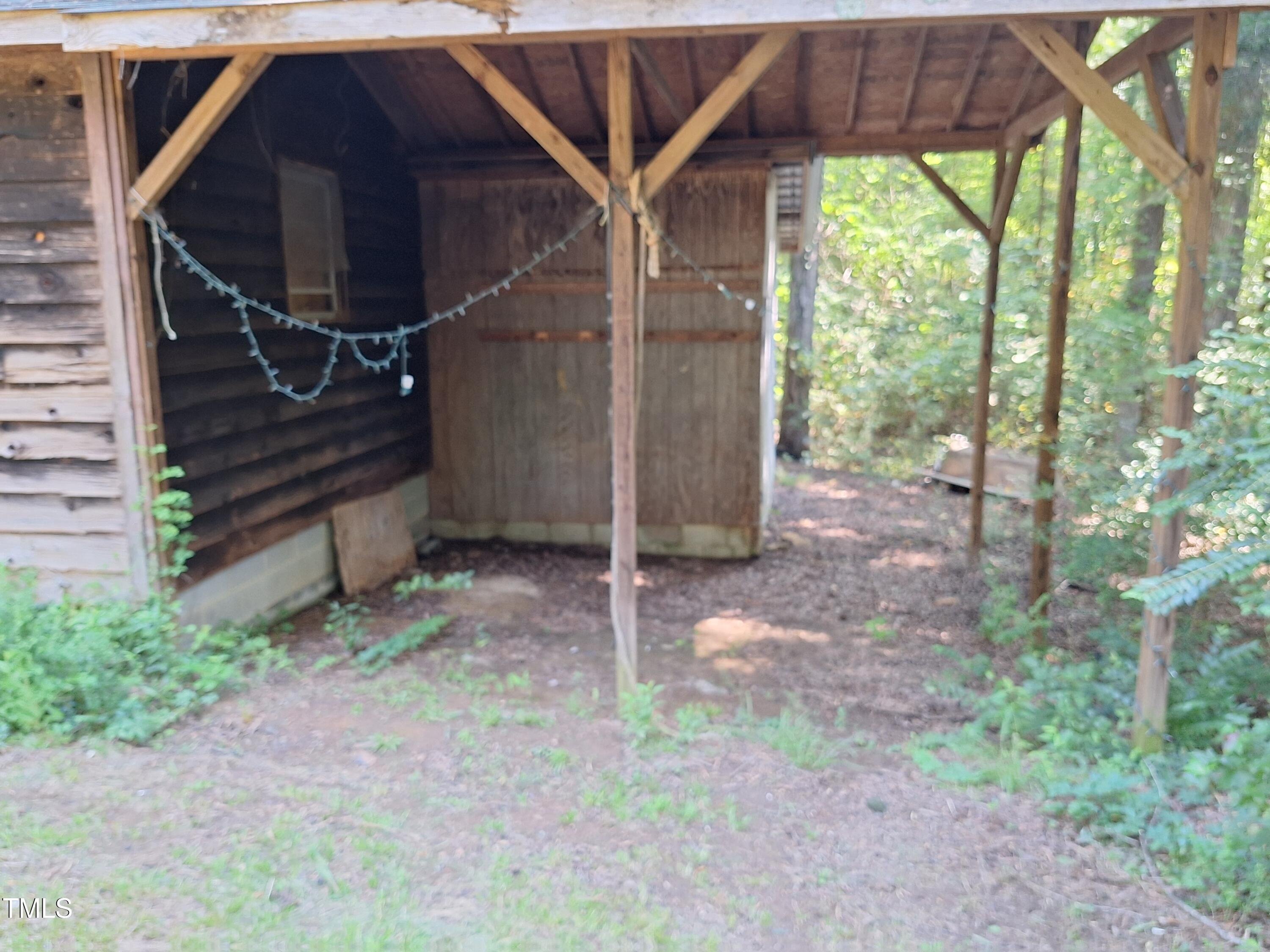 12 Nota Road Moncure, NC 27559 - Photo 28 of 30 a view of a house with backyard and garden