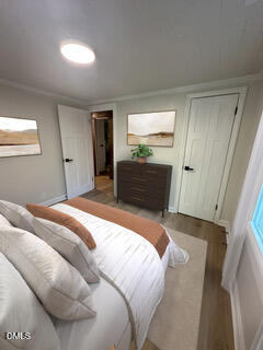 12 Nota Road Moncure, NC 27559 - Photo 3 of 30 a bedroom with a bed and a dresser