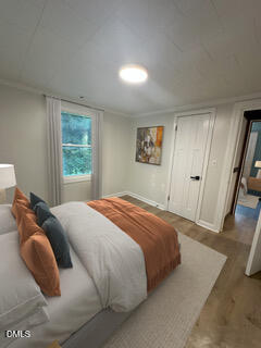 12 Nota Road Moncure, NC 27559 - Photo 4 of 30 a bedroom with a bed and a window
