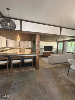 12 Nota Road Moncure, NC 27559 - Photo 5 of 30 a living room with stainless steel appliances kitchen island granite countertop furniture and a kitchen view