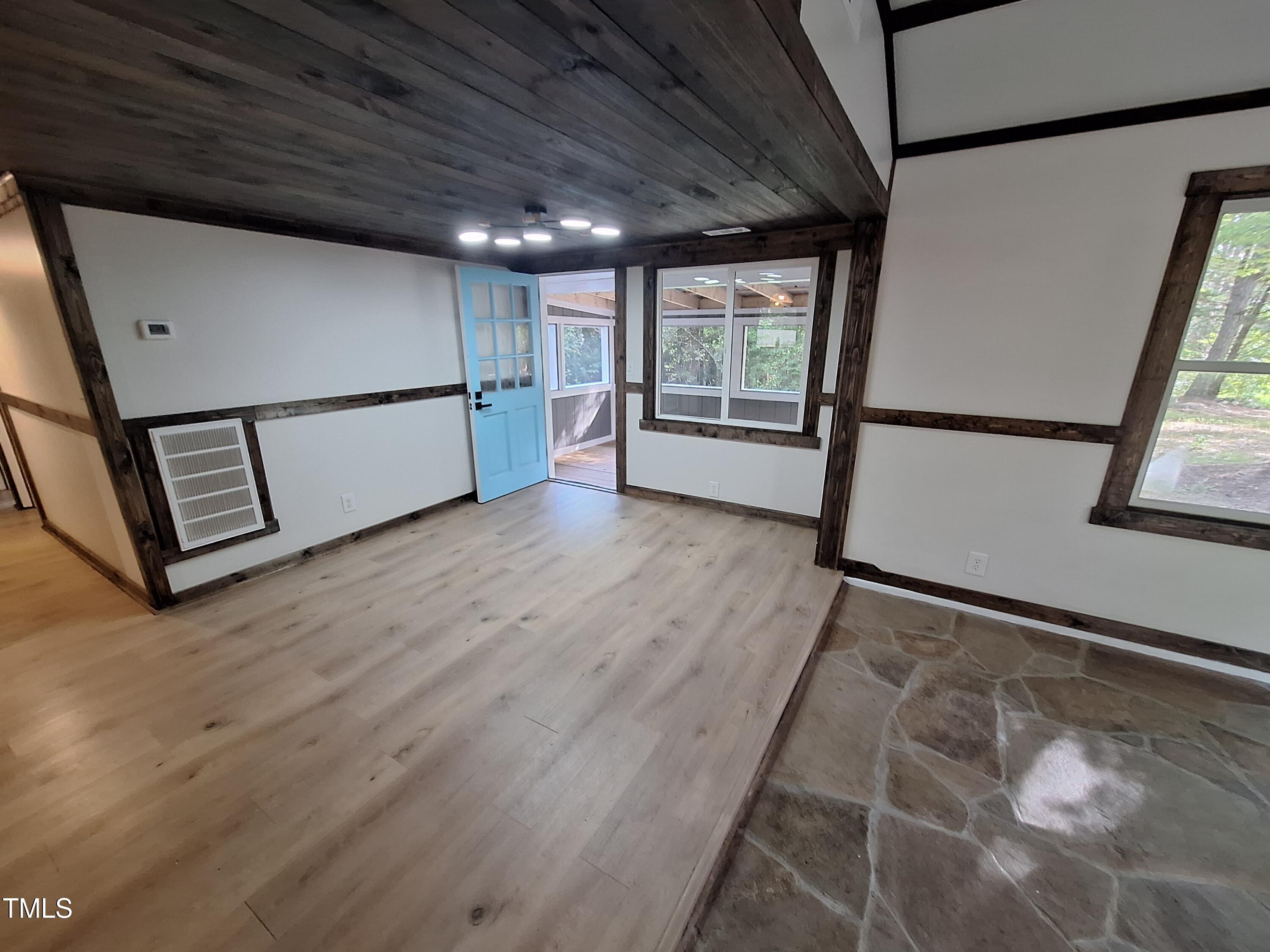 12 Nota Road Moncure, NC 27559 - Photo 6 of 30 a view of staircase with wooden floor and window