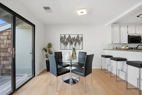 a view of a dining room with furniture