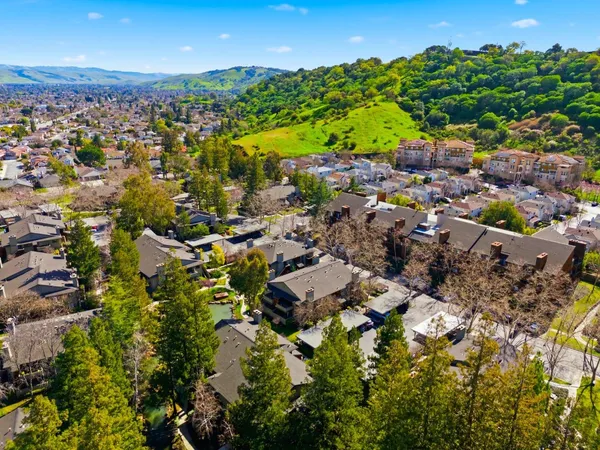 an aerial view of residential building with outdoor space
