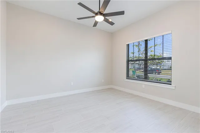 a bathroom with a sink toilet and mirror