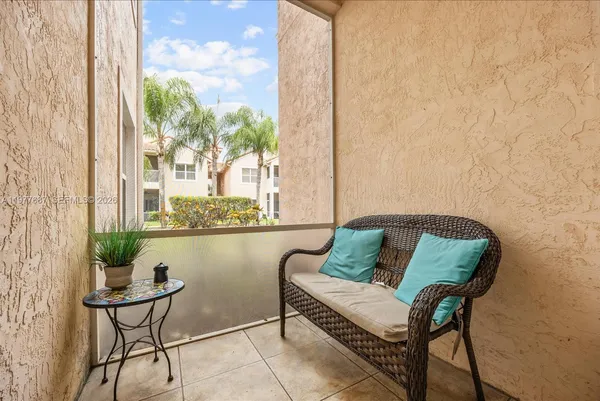an aerial view of a house a yard and lake view