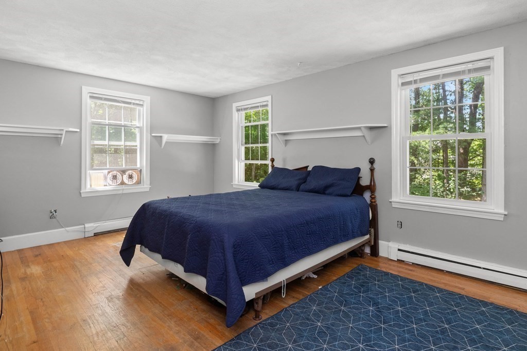 105 Valley Road Boxford, MA 01921 - Photo 14 of 41 a bedroom with a bed and window