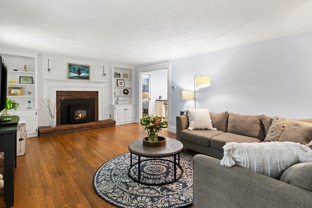 105 Valley Road Boxford, MA 01921 - Photo 8 of 41 a living room with furniture and a fireplace