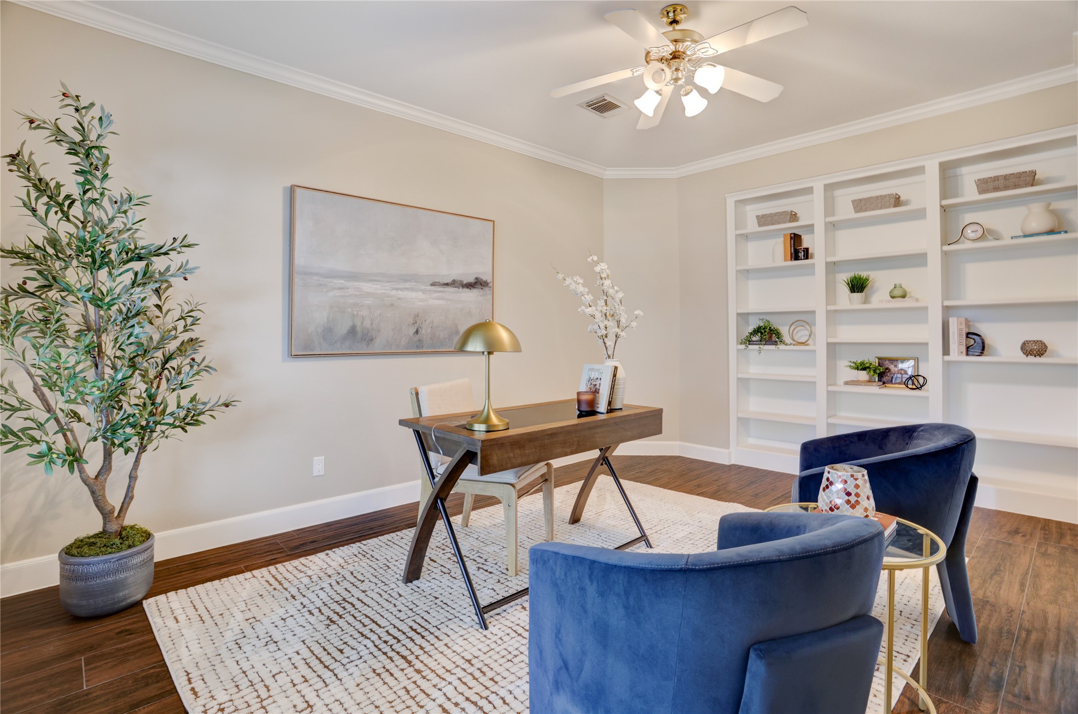 24418 Falcon Point Drive Katy, TX 77494 - Photo 4 of 40 a workspace with furniture and a potted plant