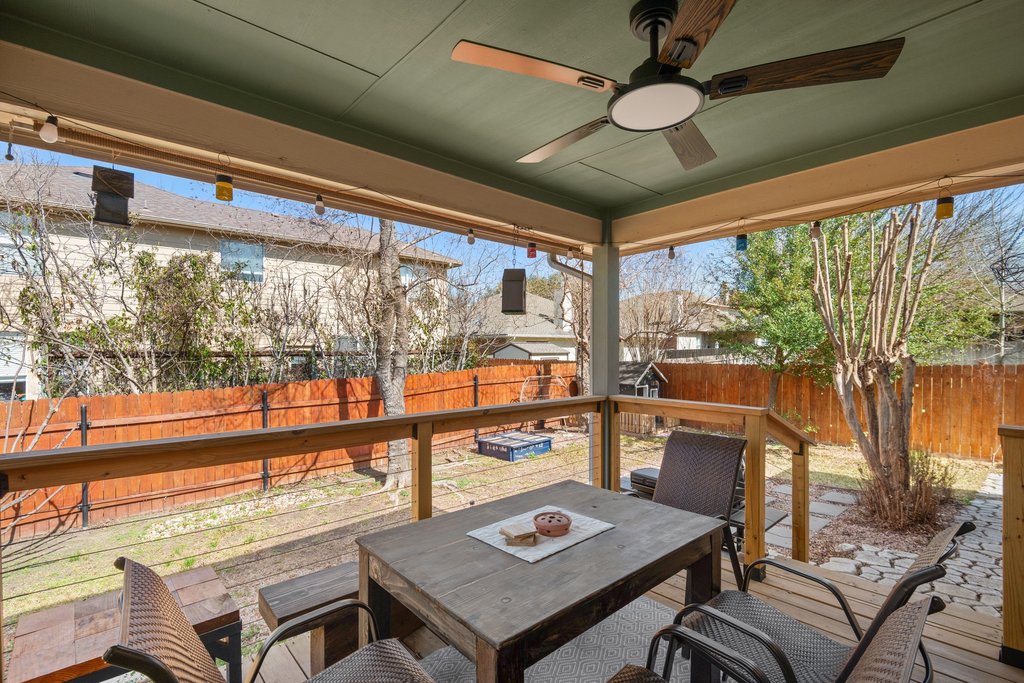 2305 Candle Ridge Trail Georgetown, TX 78626 - Photo 30 of 40 Fenced backyard with ceiling fan, outdoor dining space, and a patio area