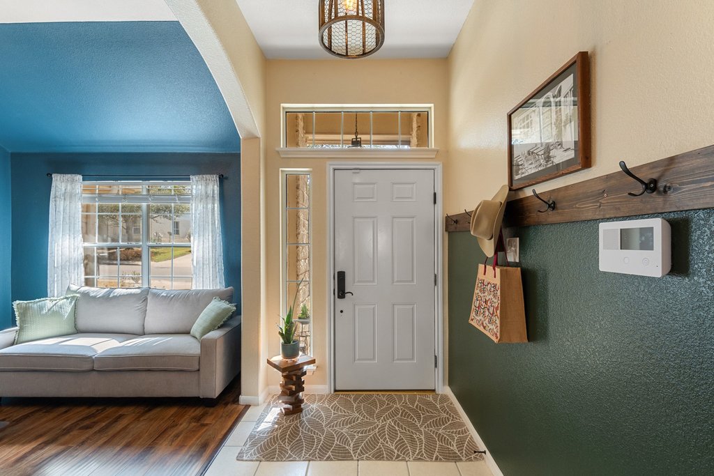 2305 Candle Ridge Trail Georgetown, TX 78626 - Photo 6 of 40 Tiled foyer entrance with baseboards
