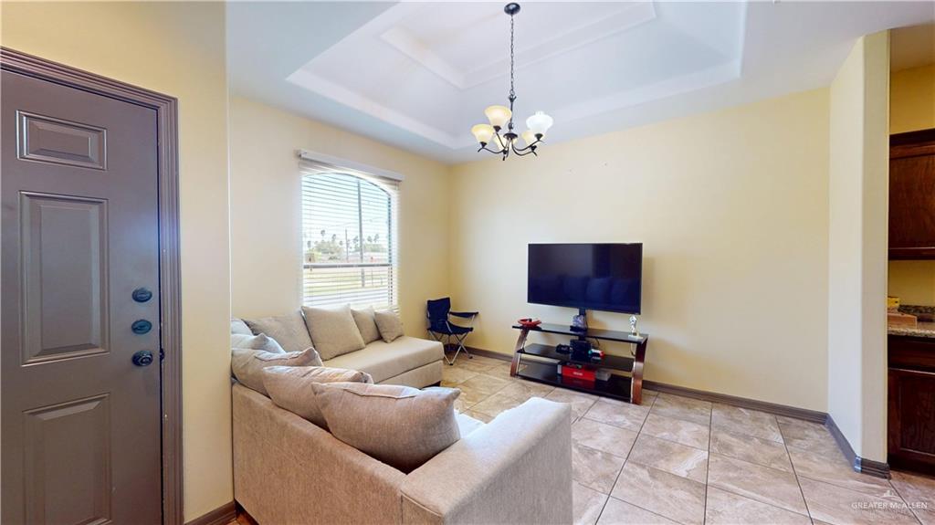 731 North Tower Road Alamo, TX 78516 - Photo 11 of 28 a living room with furniture and a window