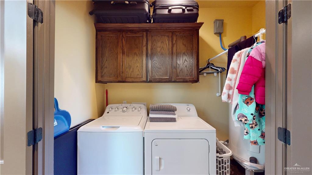 731 North Tower Road Alamo, TX 78516 - Photo 15 of 28 a utility room with dryer and washer