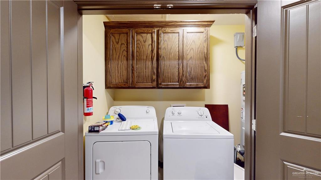 731 North Tower Road Alamo, TX 78516 - Photo 24 of 28 a utility room with dryer and washer