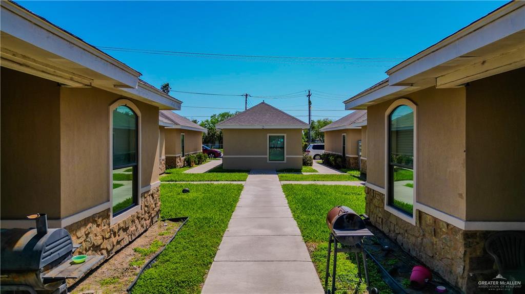731 North Tower Road Alamo, TX 78516 - Photo 10 of 28 a front view of a house with a yard