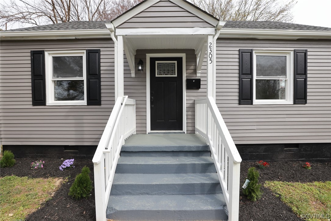 2305 Wright Avenue Richmond, VA 23224 - Photo 1 of 33 a front view of a house with a large window