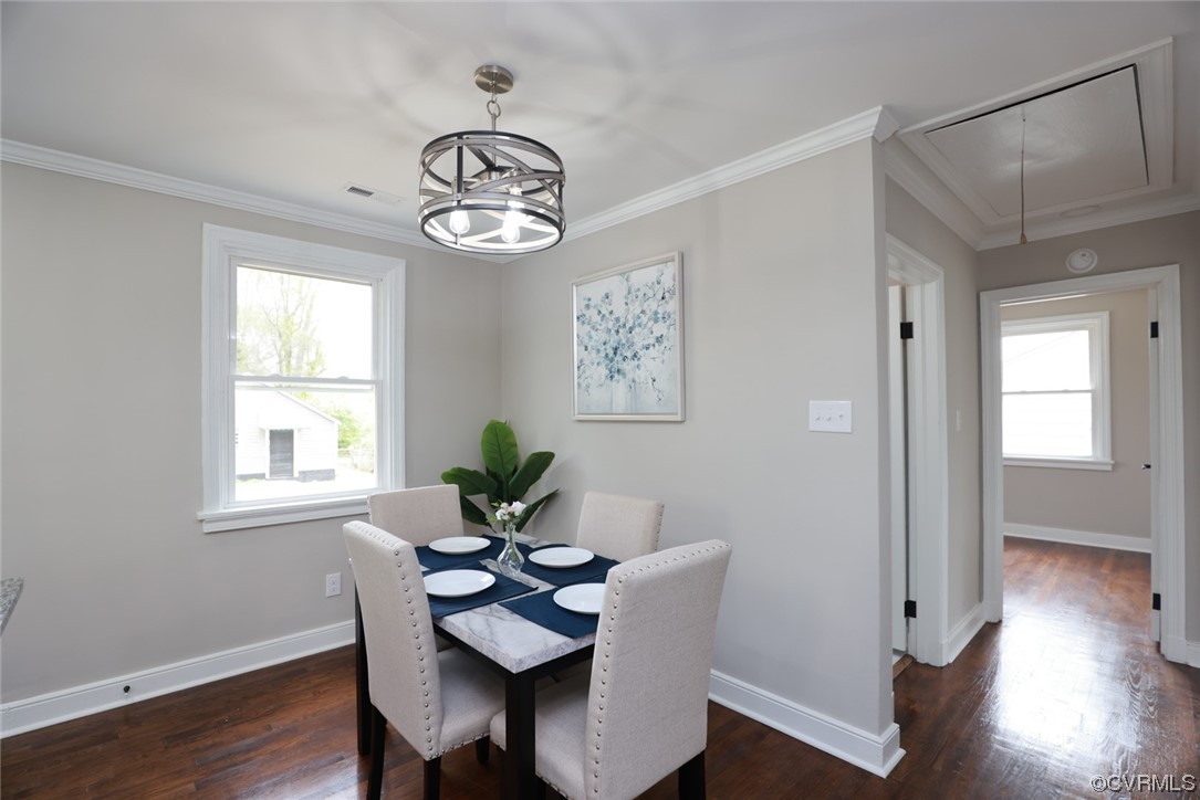 2305 Wright Avenue Richmond, VA 23224 - Photo 13 of 33 a view of a dining room with furniture window and wooden floor