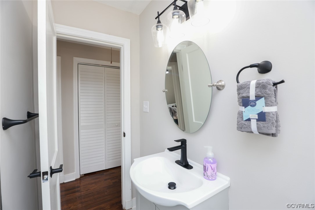 2305 Wright Avenue Richmond, VA 23224 - Photo 21 of 33 a bathroom with a sink and a mirror
