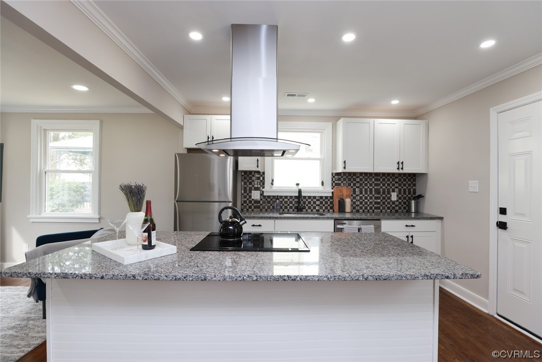 2305 Wright Avenue Richmond, VA 23224 - Photo 22 of 33 a kitchen with sink refrigerator and cabinets