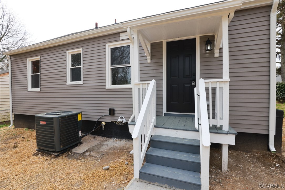 2305 Wright Avenue Richmond, VA 23224 - Photo 24 of 33 a view of wooden house with a table and chairs