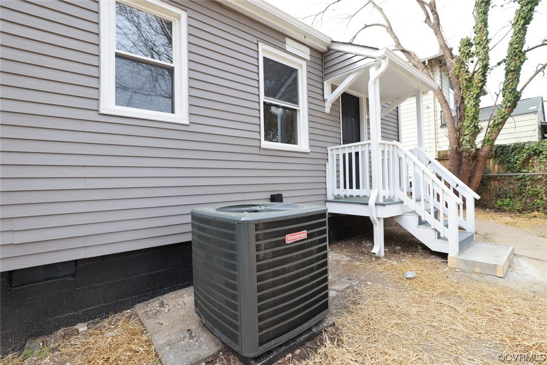 2305 Wright Avenue Richmond, VA 23224 - Photo 26 of 33 a view of a house with a deck and a yard