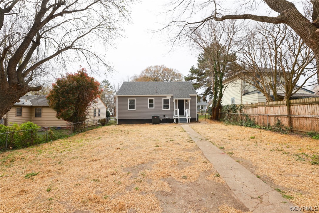 2305 Wright Avenue Richmond, VA 23224 - Photo 29 of 33 a front view of a house with a yard covered in snow