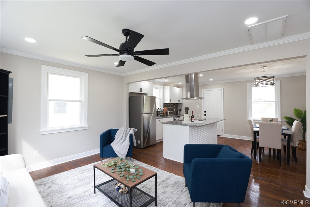 2305 Wright Avenue Richmond, VA 23224 - Photo 3 of 33 a living room with furniture and a chandelier