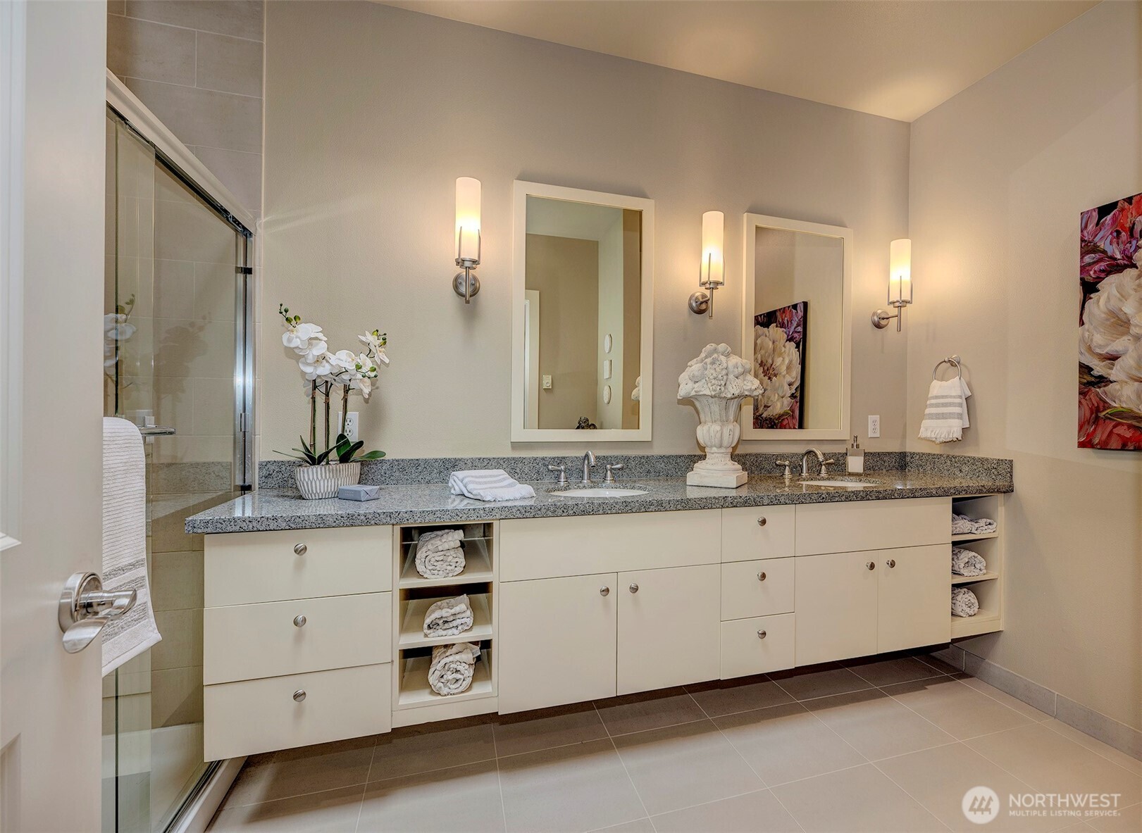61 Pine Street, Unit 201 Edmonds, WA 98020 - Photo 17 of 34 a bathroom with double sink and a mirror