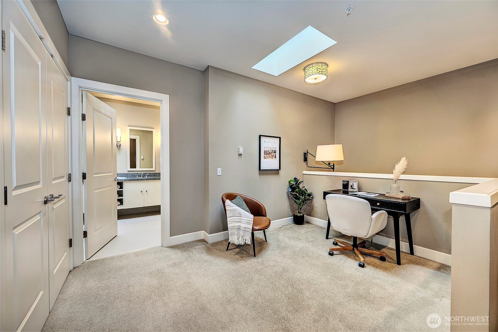 61 Pine Street, Unit 201 Edmonds, WA 98020 - Photo 19 of 34 a workspace with furniture and bathroom