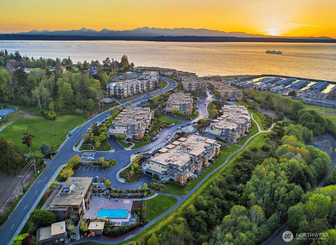 61 Pine Street, Unit 201 Edmonds, WA 98020 - Photo 22 of 34 an aerial view of lake and residential houses with outdoor space