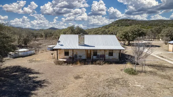 an aerial view of residential house with outdoor space