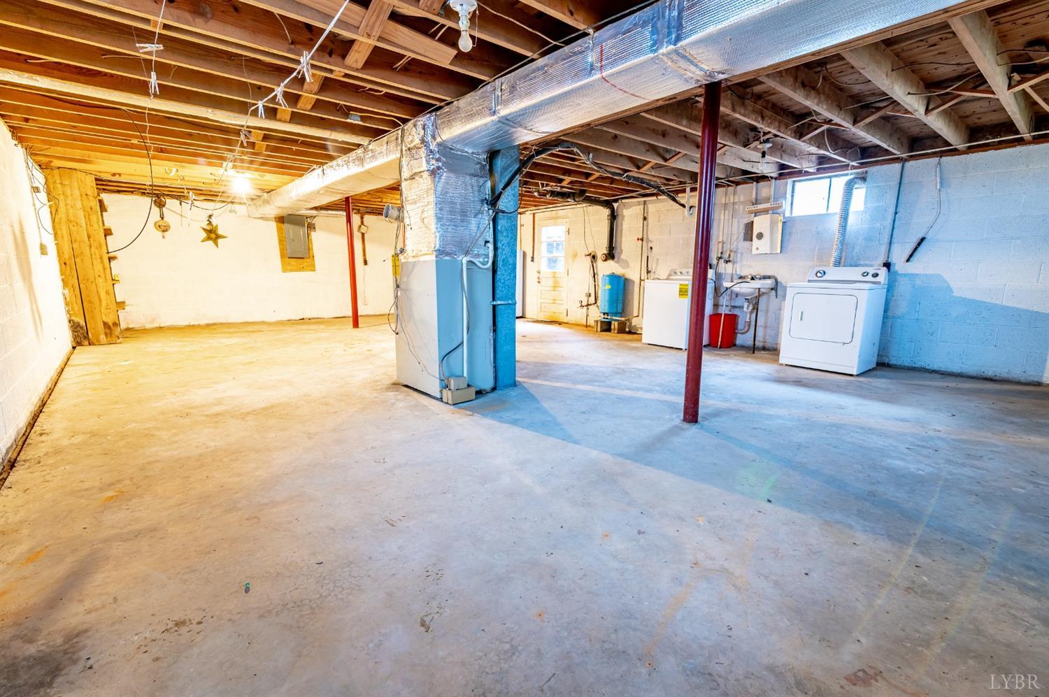 7885 Climax Road Gretna, VA 24557 - Photo 17 of 18 a view of empty room with wooden walls