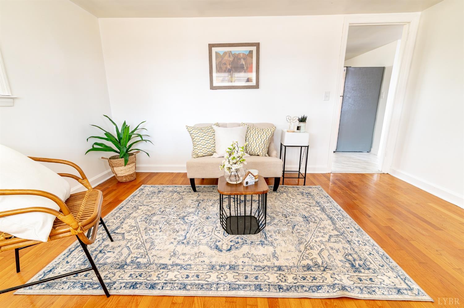 7885 Climax Road Gretna, VA 24557 - Photo 3 of 18 a living room with a couch and wooden floor