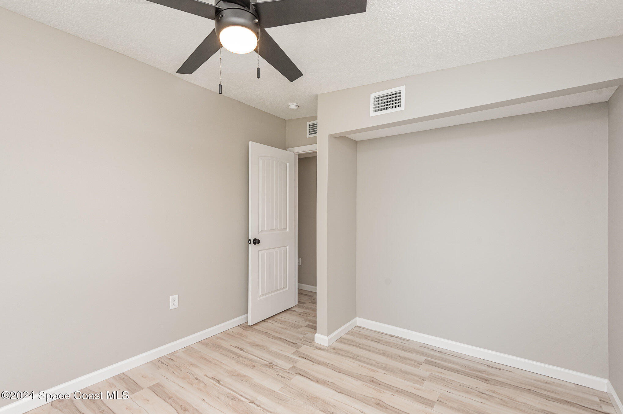 2626 Sarno Road Melbourne, FL 32935 - Photo 16 of 24 a view of an empty room