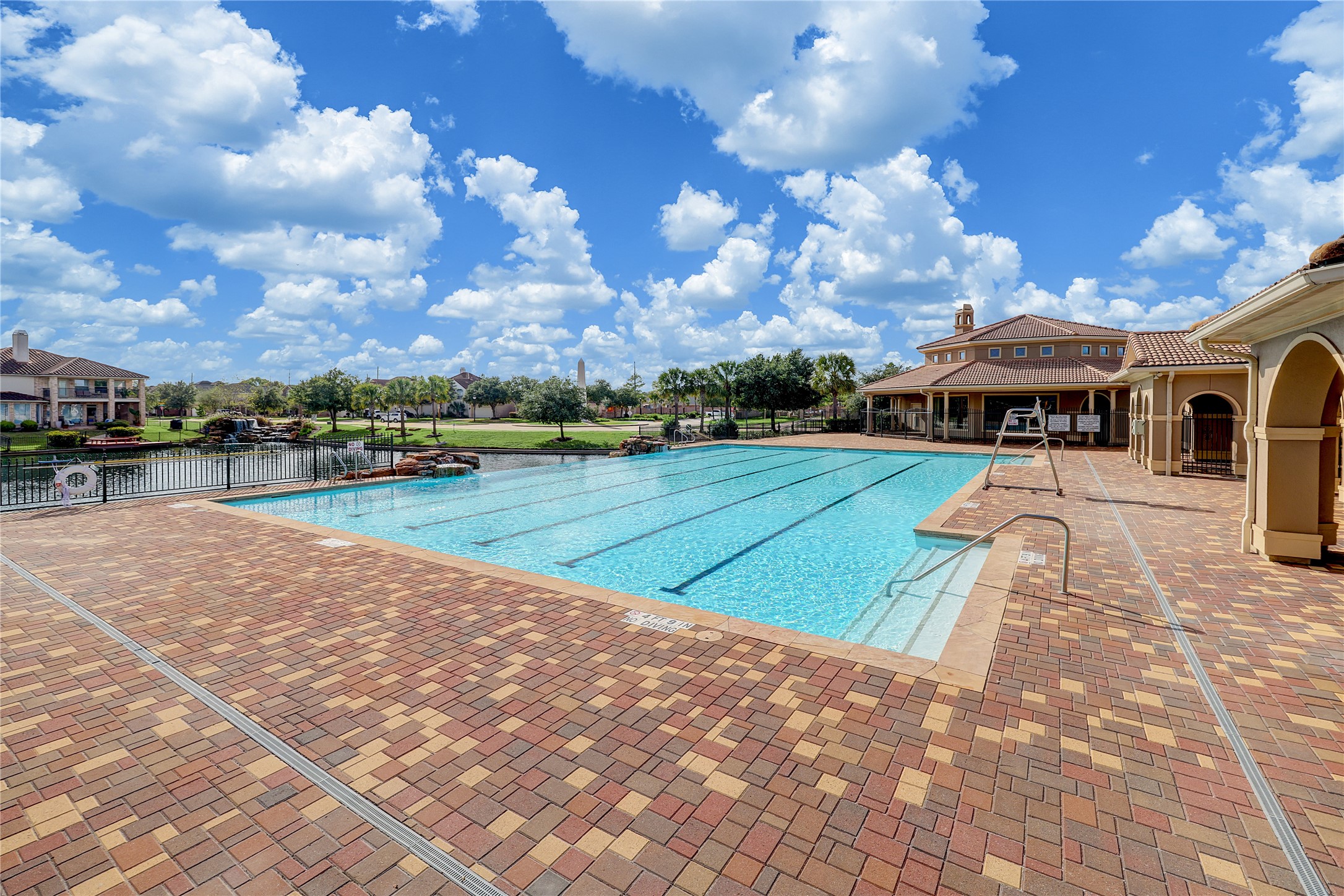 18110 Dunoon Bay Point Court Cypress, TX 77429 - Photo 26 of 27 a view of a yard with swimming pool