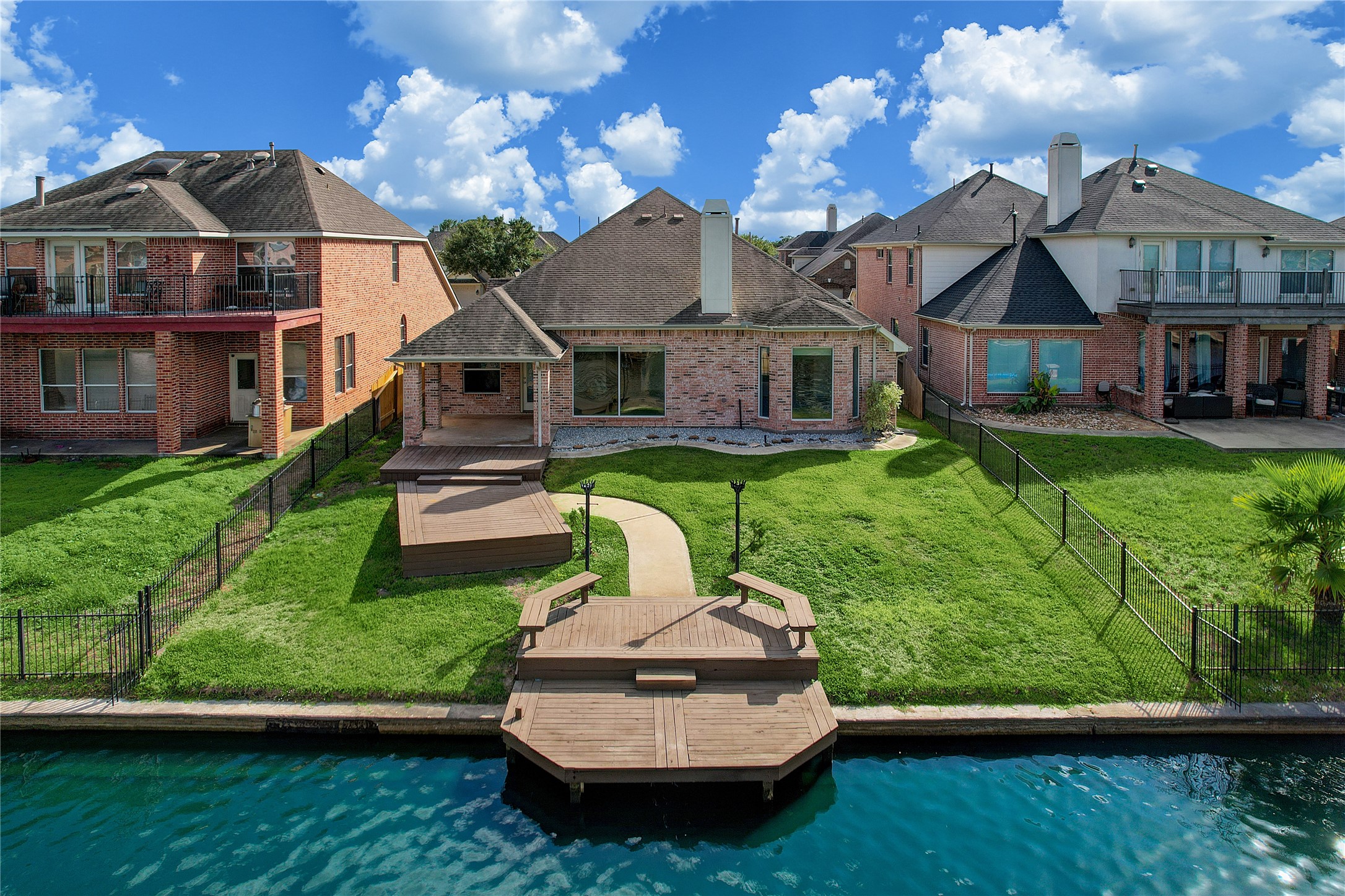18110 Dunoon Bay Point Court Cypress, TX 77429 - Photo 27 of 27 a view of house with garden