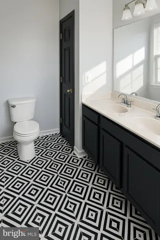 a bathroom with a sink a toilet and a bathtub