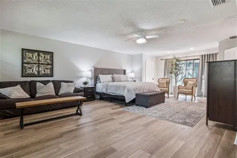 a view of a balcony with wooden floor