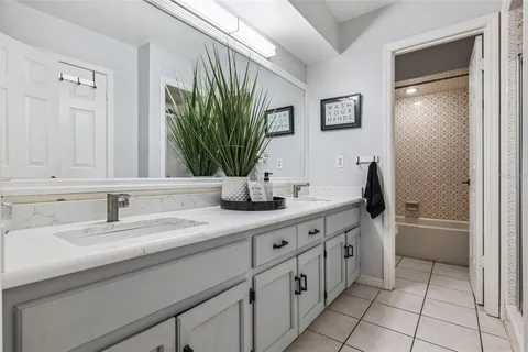 a view of a work space with furniture and wooden floor