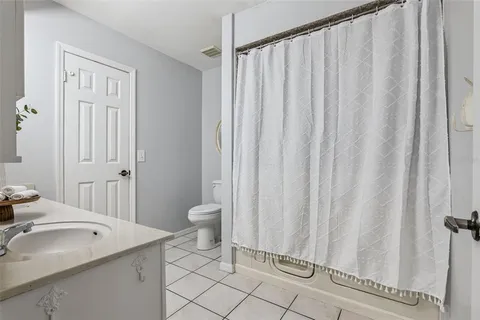 a view of a yard with table and chairs