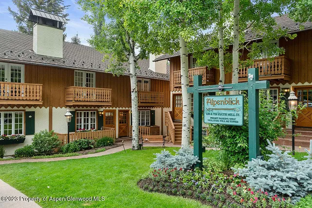 front view of a house with a garden