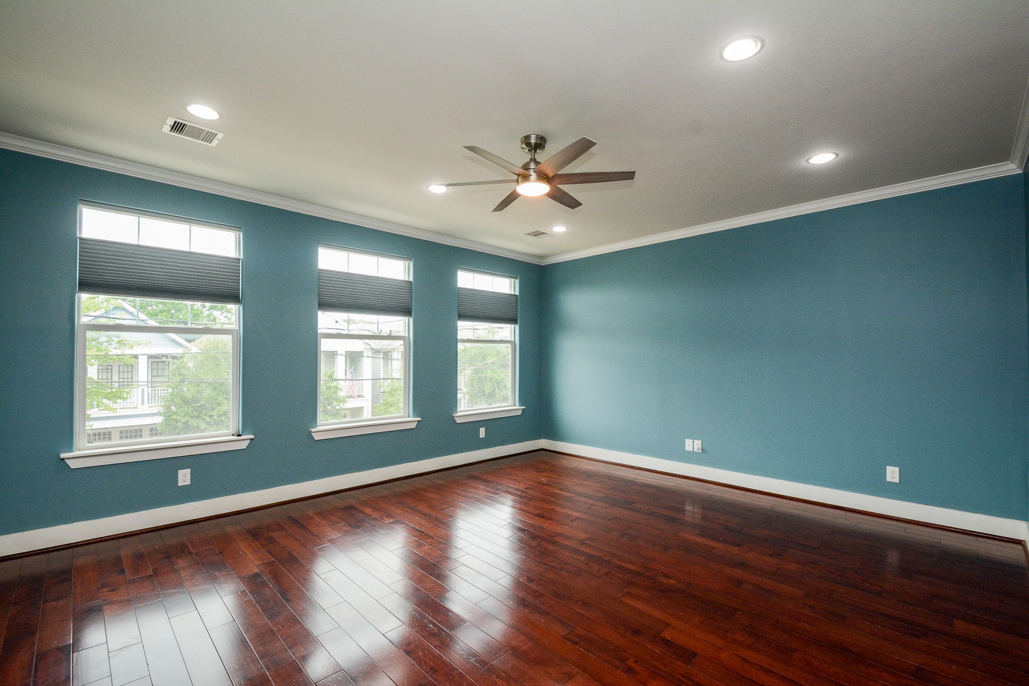 1514 Prince Street Houston, TX 77008 - Photo 20 of 20 a view of an empty room with wooden floor and a window