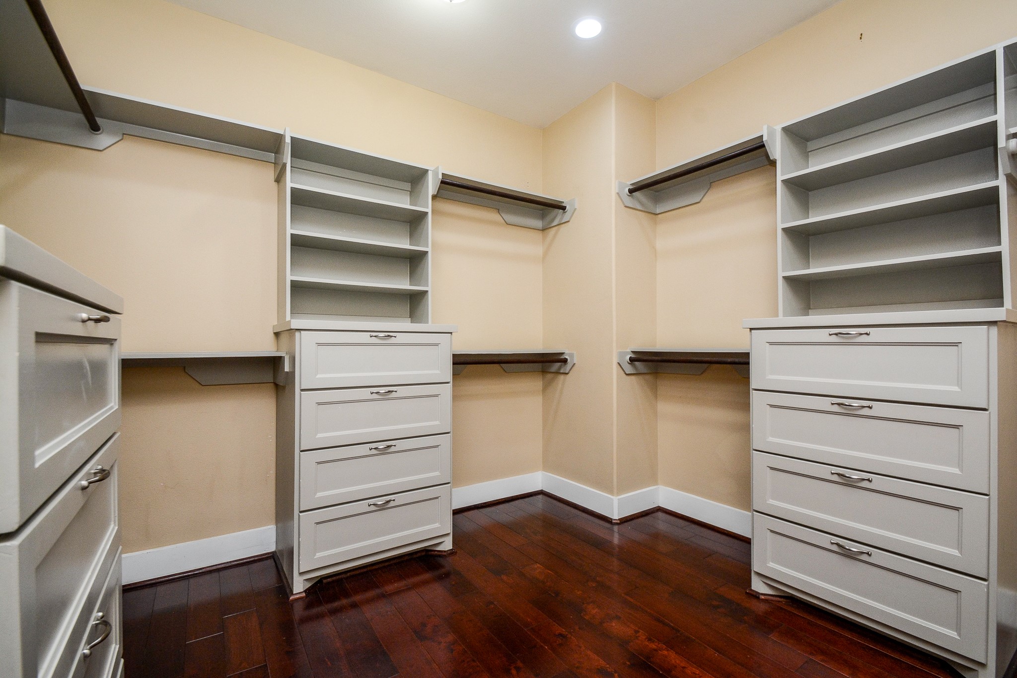 1514 Prince Street Houston, TX 77008 - Photo 2 of 20 a view of walk in closet with empty racks