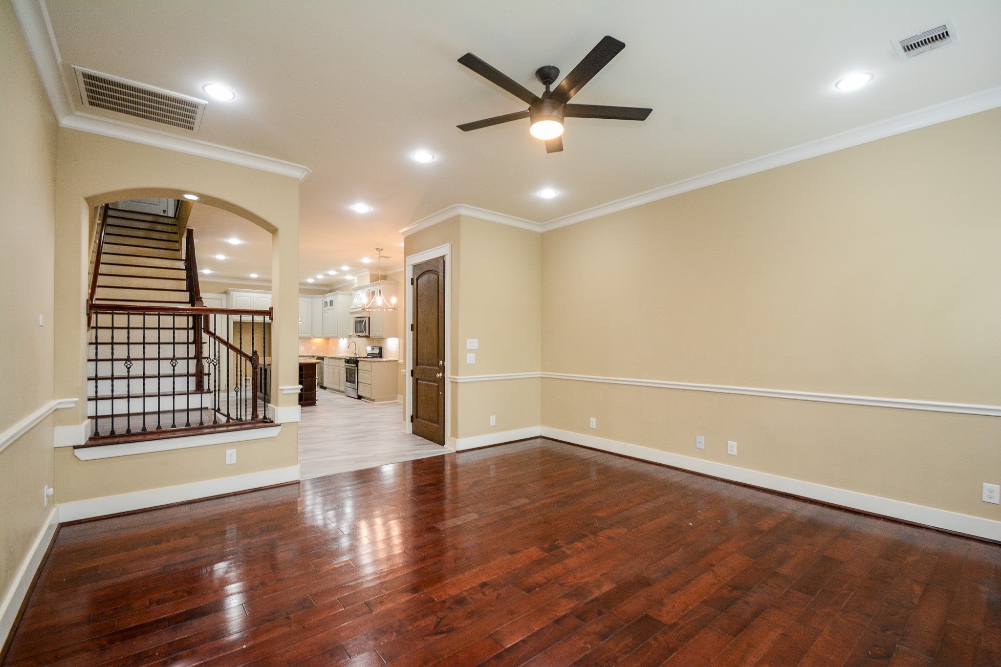 1514 Prince Street Houston, TX 77008 - Photo 6 of 20 an empty room with wooden floor and windows
