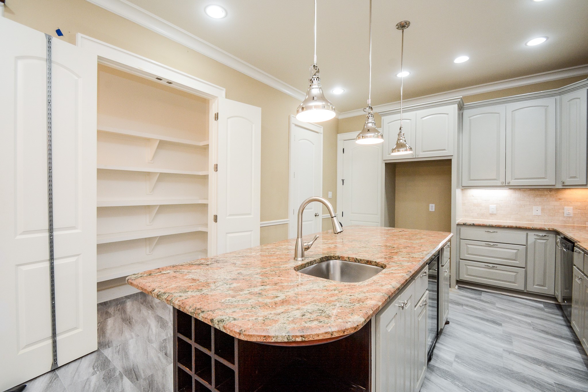 1514 Prince Street Houston, TX 77008 - Photo 9 of 20 a kitchen with kitchen island a sink appliances and cabinets