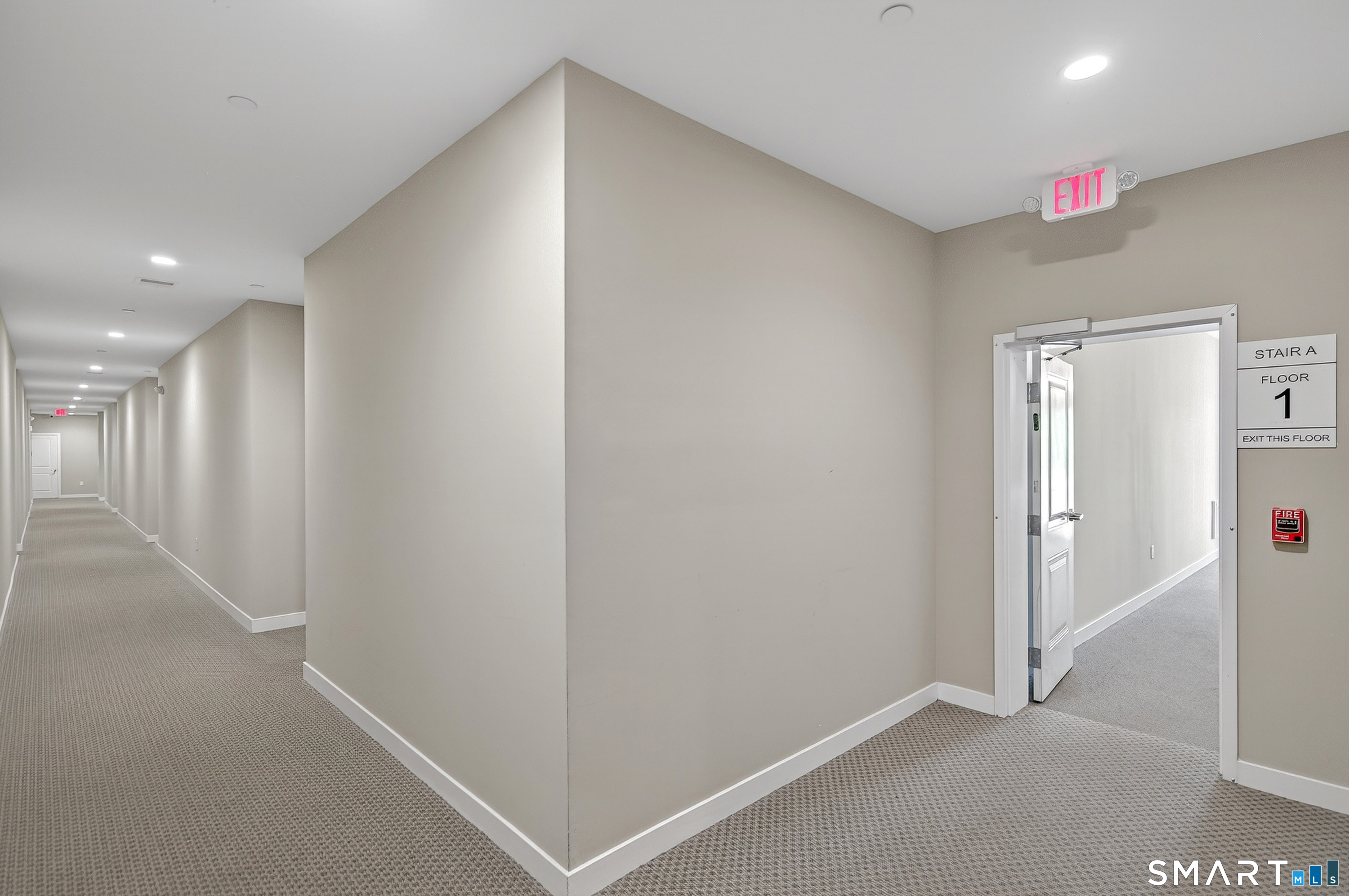 9 Covered Bridge Road, Unit 5107 Newtown, CT 06470 - Photo 4 of 27 Interior view of the hallway you'll find on each floor of the buildings.
