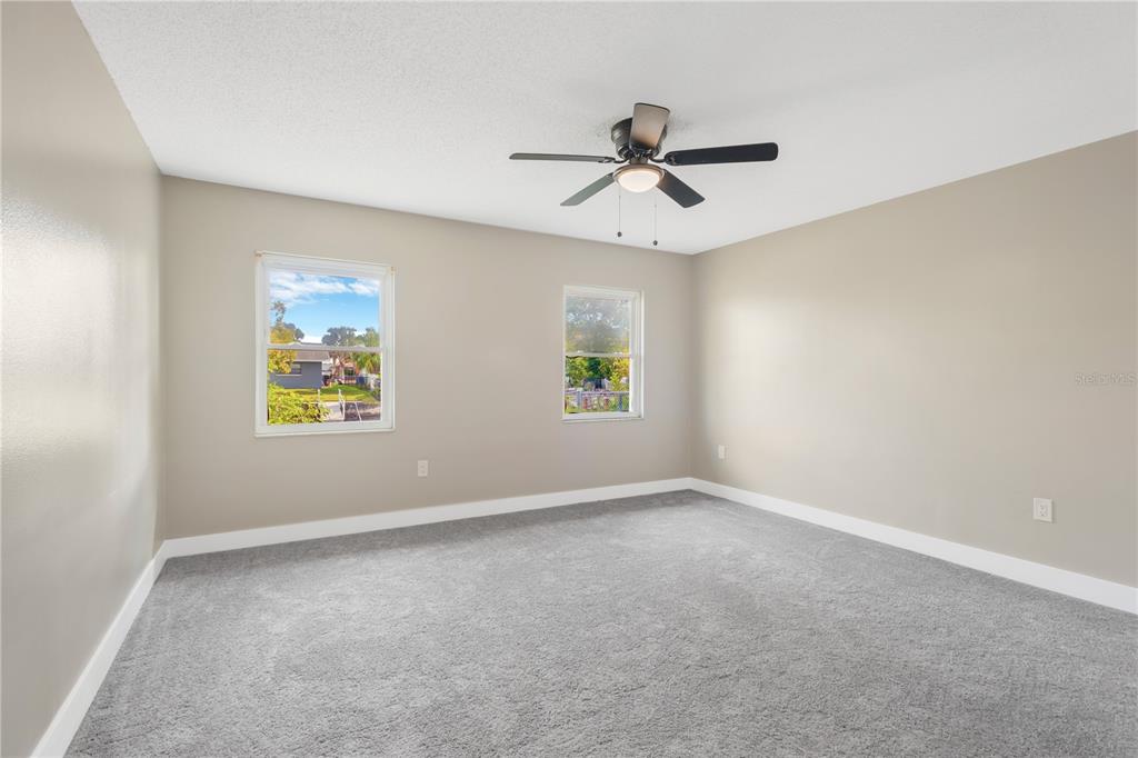 9840 San Sebastian Way Port Richey, FL 34668 - Photo 18 of 45 a view of an empty room with a window