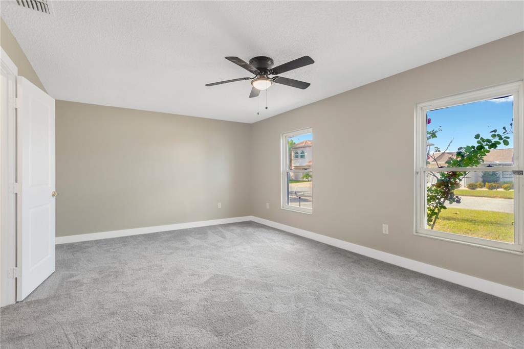 9840 San Sebastian Way Port Richey, FL 34668 - Photo 20 of 45 a view of an empty room with a window