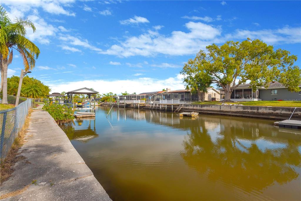 9840 San Sebastian Way Port Richey, FL 34668 - Photo 30 of 45 a view of a lake with boats