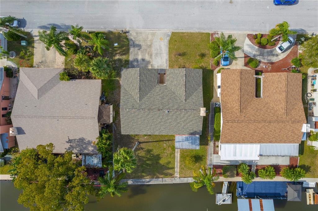 9840 San Sebastian Way Port Richey, FL 34668 - Photo 37 of 45 an aerial view of residential house with outdoor space and swimming pool